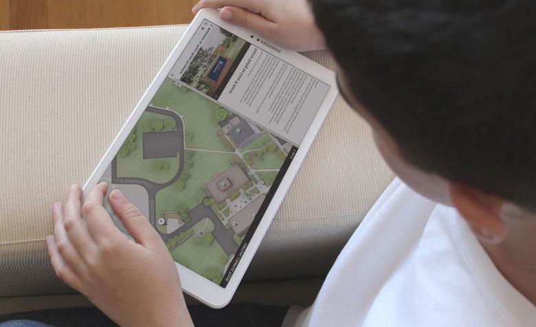 student looking at interactive map on a tablet